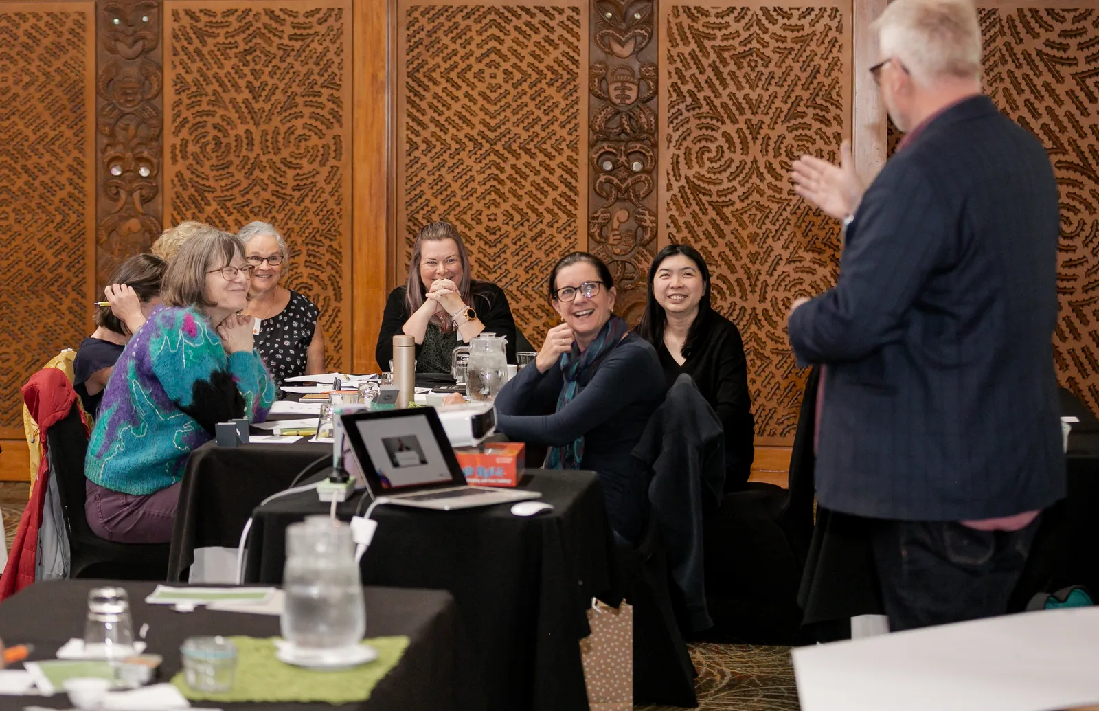 Workshop participants laughing and engaged